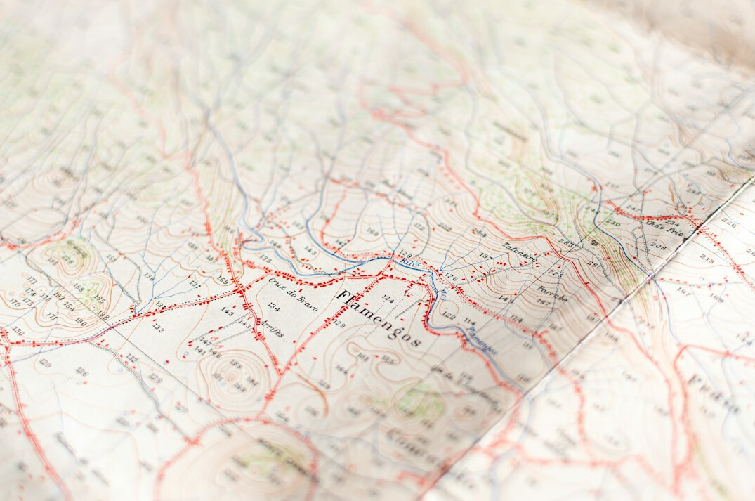 detective looking at old map